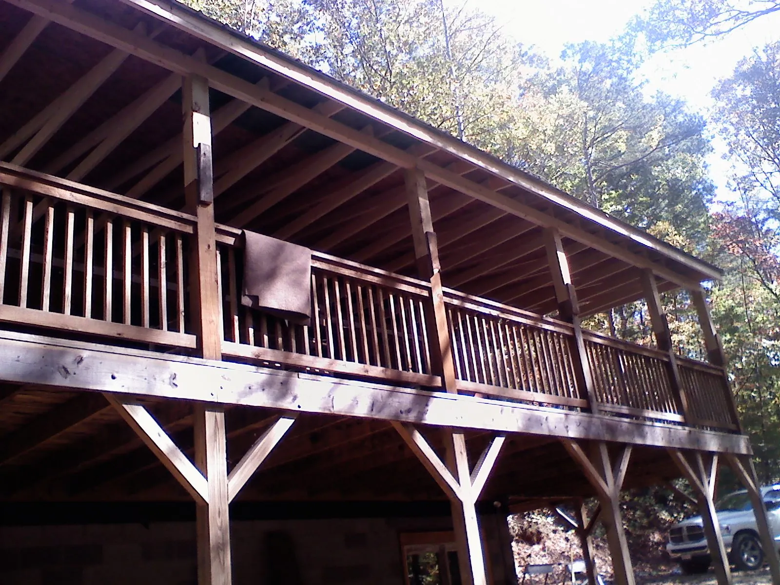 Timber framing under a new elevated porch and deck — Roof Leak Repair in Eola by Roofing Brothers